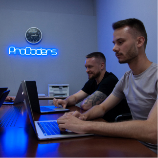 ProCoders developers sitting with laptops